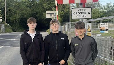 Teenagers save life of suicidal man by pulling him away from oncoming train