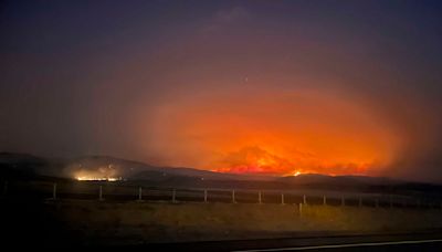 Wildfires threaten communities in the West as Oregon fire closes interstate, creates its own weather