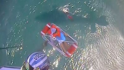 5 boaters found clinging to a cooler in Lake Erie are rescued by a Coast Guard helicopter crew