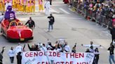 Pro-Palestine protestors briefly blocked Macy's Thanksgiving parade route by gluing their hands to the ground