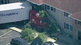 Semi truck crashes into apartment building in Morris