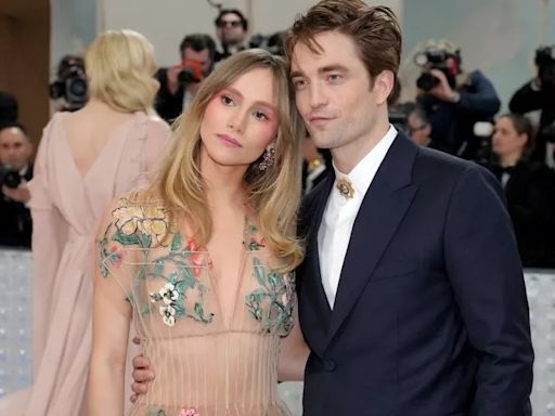 Suki Waterhouse praises 'calm' new dad Robert Pattinson as she poses with baby daughter
