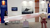 Japan plans to develop longer-range missiles to counter China, Russia
