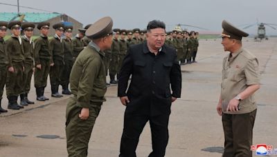 North Korea floods: Kim Jong Un visits affected areas, takes a boat ride through flooded streets — see pics - CNBC TV18