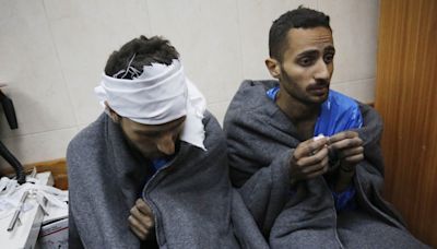 Israeli guards strapped wounded Palestinian detainees to their beds wearing diapers and fed them through straws, report says
