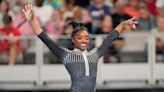 Simone Biles brilliant in surging to early lead at US gymnastics championships
