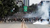 Protesters killed as thousands of Kenyans protesting new taxes storm parliament | CBC News