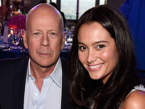 Bruce Willis cozies up to wife Emma Heming in rare peek inside their private celebration with daughters Mabel and Evelyn