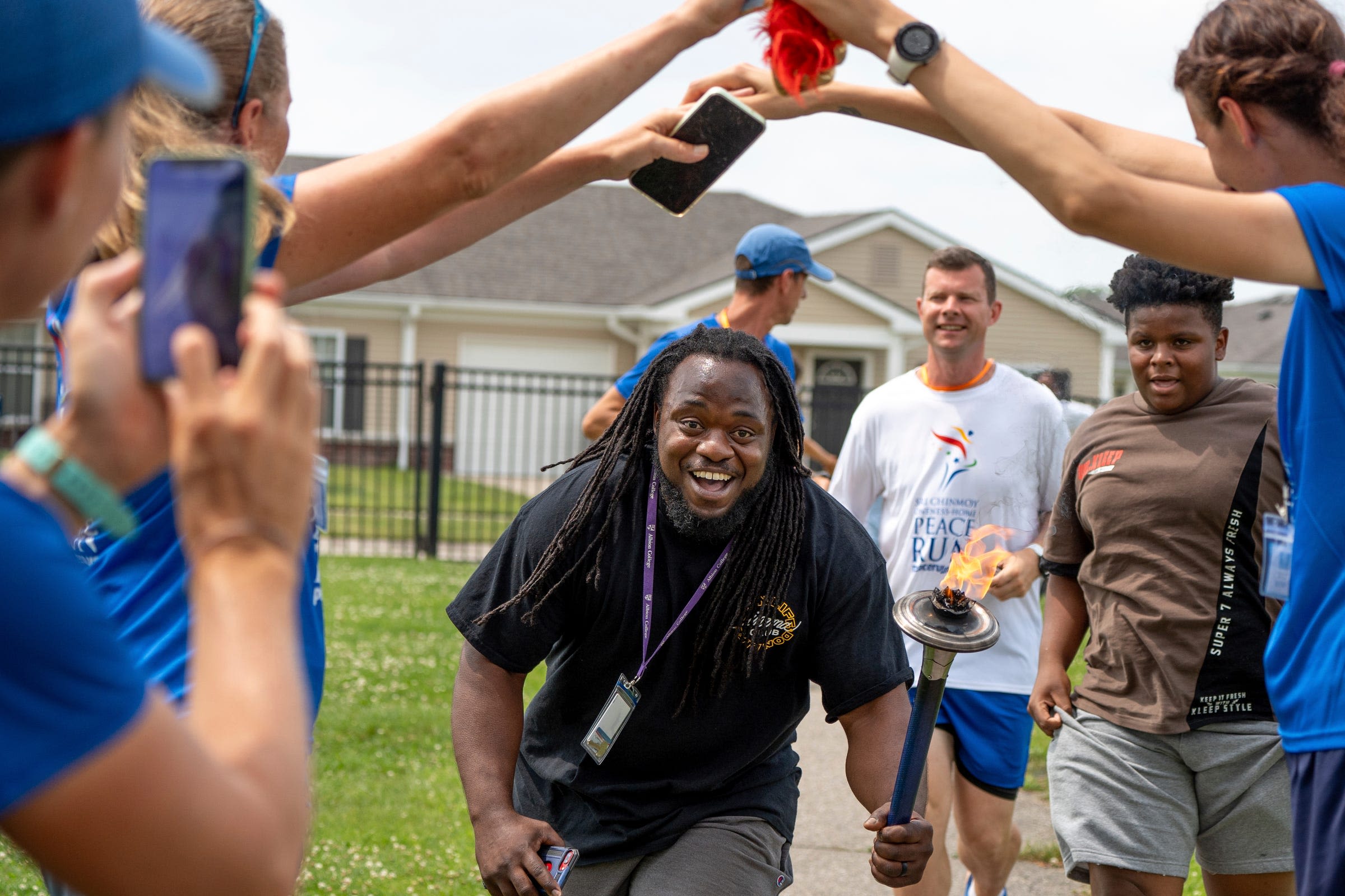 'It fills you with hope for humanity': International torch relay runners stop in Detroit