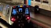 Man jumps on back of Metro train, illegally rides from outside