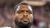 Jets releasing durable guard Laken Tomlinson, AP source says. Move saves New York about $8.1 million