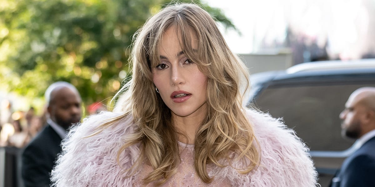 Suki Waterhouse Is Nearly Naked in See-Through Lace Dress Under Faux Fur Coat