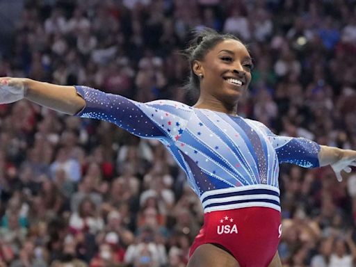 Biles leads big at trials; injuries hit 2 other stars