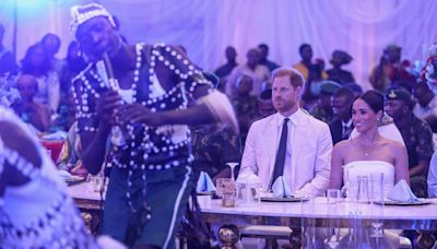 Meghan Markle Has Glam Moment in Strapless Dress at Reception with Prince Harry in Nigeria