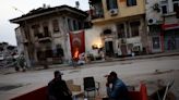 In Turkey's quake-devasted city of Antakya, an antiques seller is determined to stay put