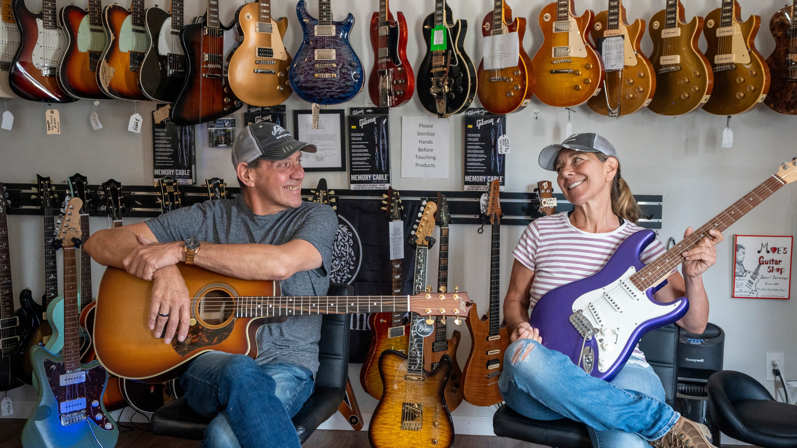 Moe's Guitars is more than a store. It's a gathering spot for guitarists: Photos