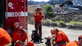 Southern California bakes under another day of scorching heat, fires and smog