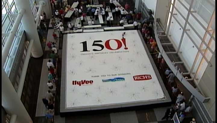 Omaha celebrates 150th birthday in 2004 with ginormous cake and KETV's Rob McCartney