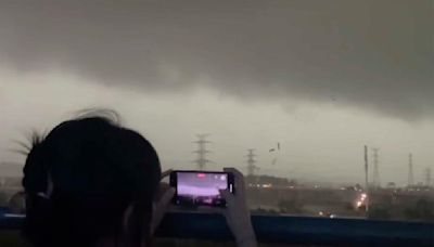 A tornado in southern China kills 5 people and damages factories in the metropolis of Guangzhou