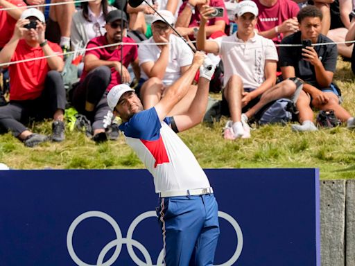 Scottie Scheffler's late charge wins golf Olympic gold for Team USA