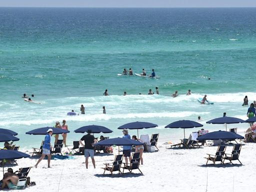 Back-to-back shark attacks injure 2 teens, adult near Florida beach; one victim loses arm