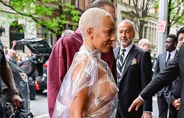 Doja Cat Arrives at Hotel Ahead of Met Gala Nearly Naked Under a Plastic Bag