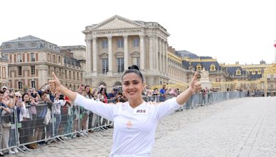 Salma Hayek Got Hyped For Her Olympic Torch Relay Run in Paris By Blasting ‘Lose Yourself,’ Naturally