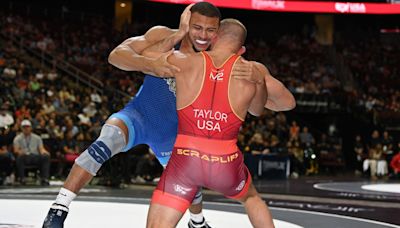 Who stands in Aaron Brooks' way at the U.S. Olympic Wrestling Trials?