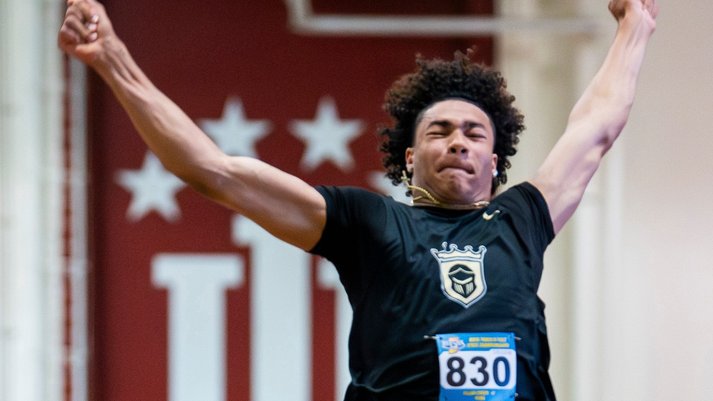 Penn's Elijah Coker moves indoor to win long jump state championship