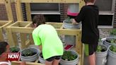 St. Paul Church of Christ teaching kids about food with garden bucket project