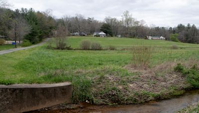 After months of delays, Asheville council OKs divisive 84-unit Haw Creek development