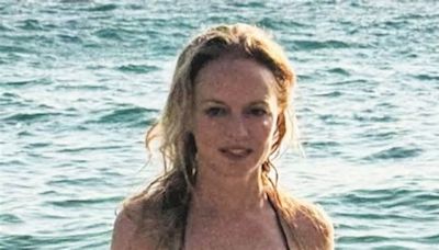 Heather Graham, 54, wows in tiny bikini as fans say she looks 'same' as 27 years ago