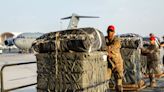 60 bundles of food fell into the sea as a US military C-130 aircraft attempted to drop aid into war-torn Gaza