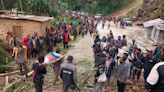 Emergency crews in Papua New Guinea move survivors of massive landslide to safer ground