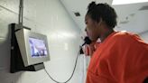 Denied the 'right to hug': In many U.S. jails, video calls are replacing in-person visits