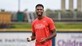 Pensacola Catholic alum and Ole Miss champion T.J. McCants fires first pitch at Blue Wahoos game