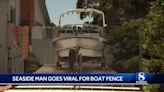 Watch: Man ordered to hide his boat has vessel painted on new fence