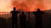 Western US faces wildfires as millions under heat warnings