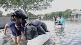 South Floridians mop up, recall fear after historic deluge