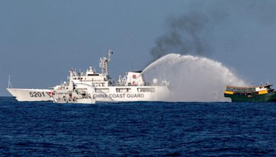 US and Philippine forces sink a ship during large-scale drills in the disputed South China Sea