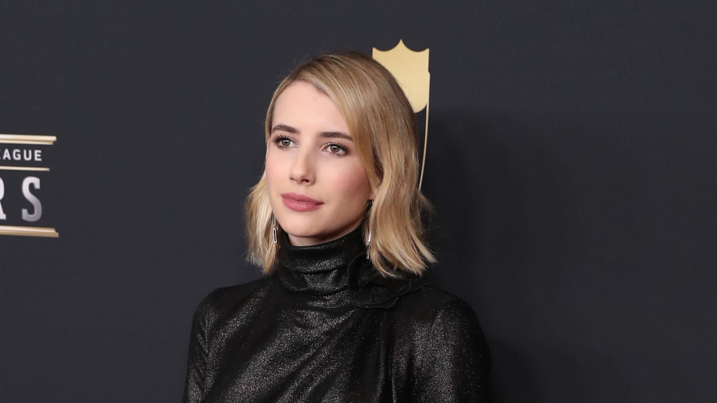 Emma Roberts Paired This Unexpected Footwear With Her Blue Cut-Out One-Piece