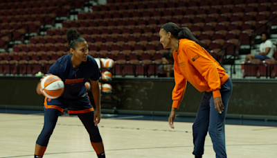 Connecticut Sun's DeWanna Bonner and Alyssa Thomas are teammates, and engaged. Here's their love story.