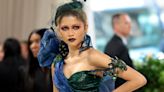 Zendaya attended the 2024 Met Gala in a dramatic gown covered in grapes