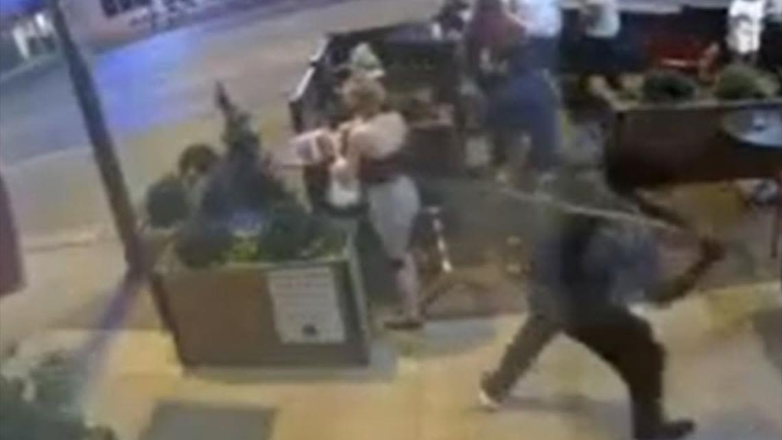 Bartender knocked to the ground by man wielding a stick in random downtown Dallas attack