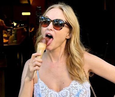 Heather Graham looks so young in plunging dress during romantic getaway