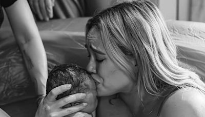 Hilary Duff tearfully holds baby daughter after water birth in emotional pics