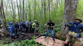 40 people rush to help horses stuck in mud up to their bellies in CT. See the rescue