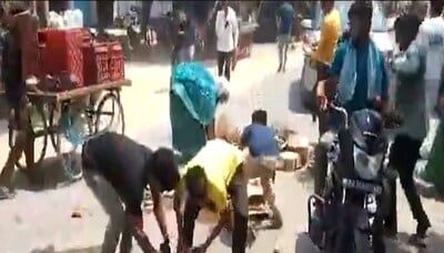 Mass looting of liquor in Agra as 30 boxes fall off truck, video goes viral