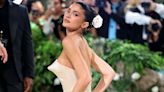 Kylie Jenner Rocks a Gown with a Cone Bustier and Flower in Her Hair for Head-Turning 2024 Met Gala Appearance