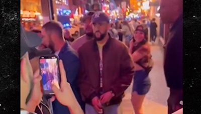 Bad Bunny Looks Miserable As He's Mobbed By Nashville Fans Taking Pics